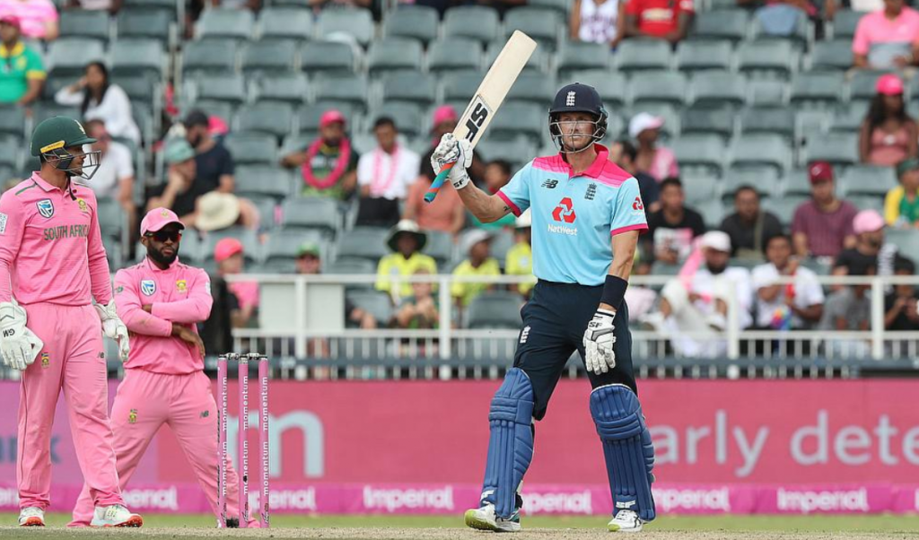 England's Joe Denly celebrates his half century